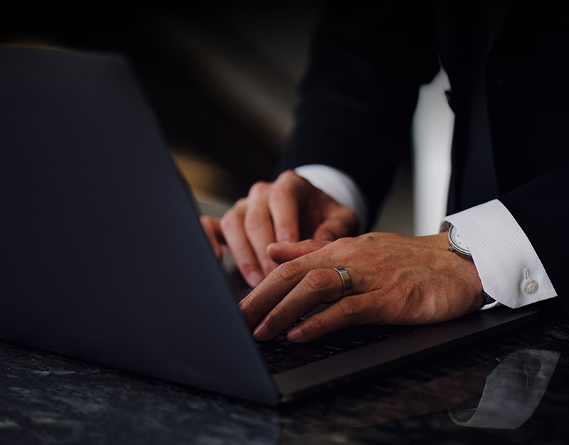 Career counsellor analyzing a student's profile and resume to identify career gaps on a laptop in Mumbai.